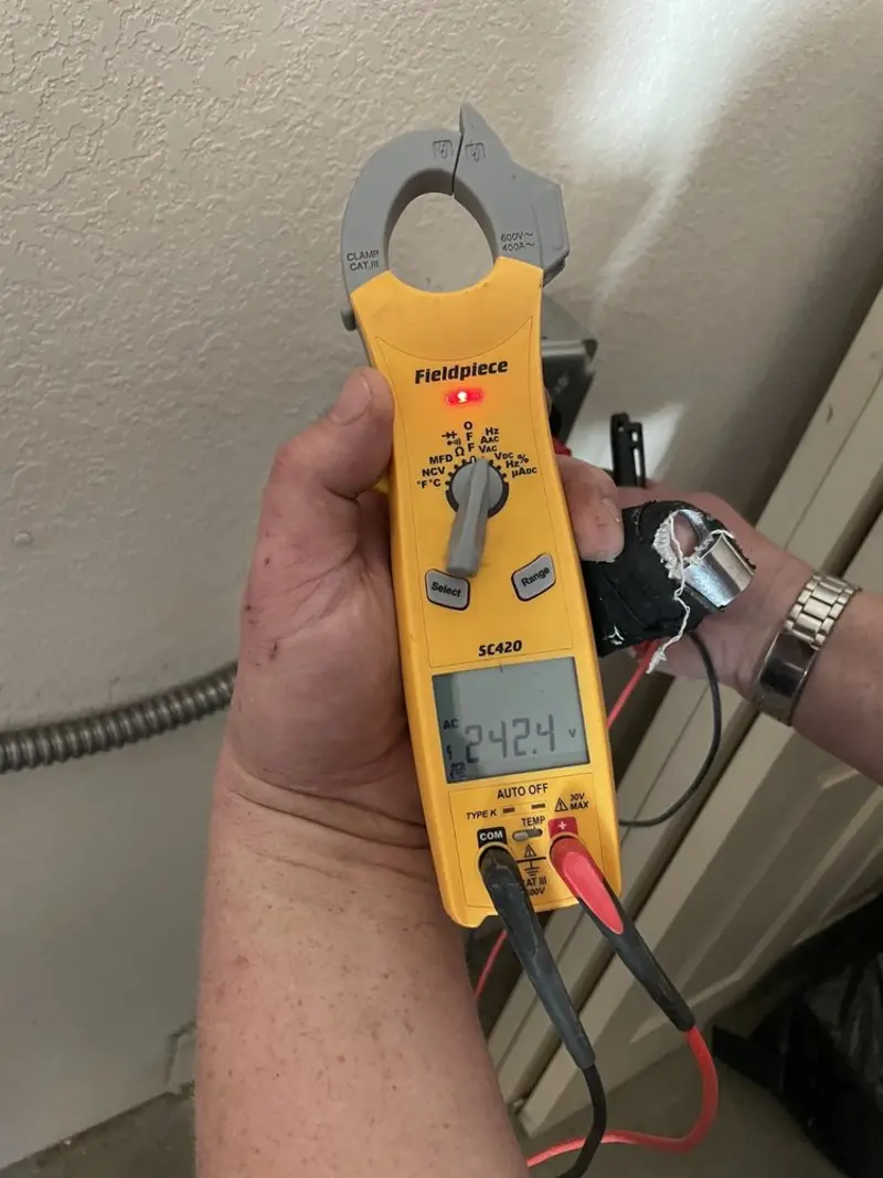 Voltage testing with clamp meter during Generator Installation in Empire